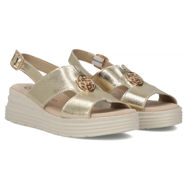 Skórzane sandały na koturnie Filippo DS6712/25 GO złote